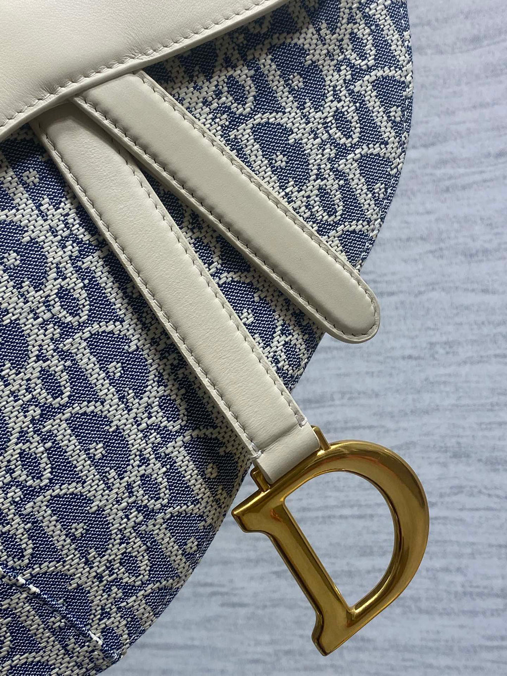 DIOR 25S SOFT SADDLE BAG 25 IN BLUE DIOR OBLIQUE CHAMBRAY AND IVORY SMOOTH CALFSKIN