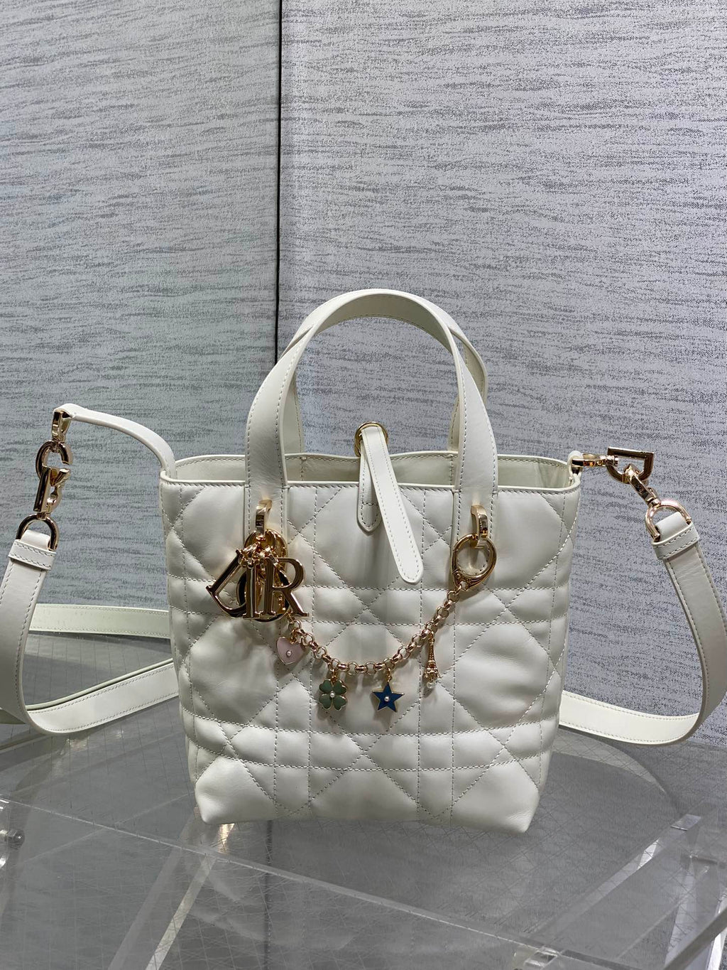 DIOR 25S TOUJOURS VERTICAL TOTE BAG 18 IN IVORY CALFSKIN WITH CHARM BRACELET STRAP